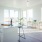Living space and kitchen with huge windows
