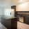 Large, open living space and kitchen with an island