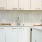 Kitchen with ample cabinet space and quartz countertops