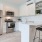 Large, open kitchen with a bar