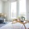 Bedroom with doors open to the balcony