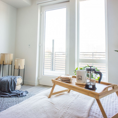 Bedroom with doors open to the balcony Bedroom with doors open to the balcony