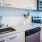 Kitchen with ample cabinet space and quartz countertops